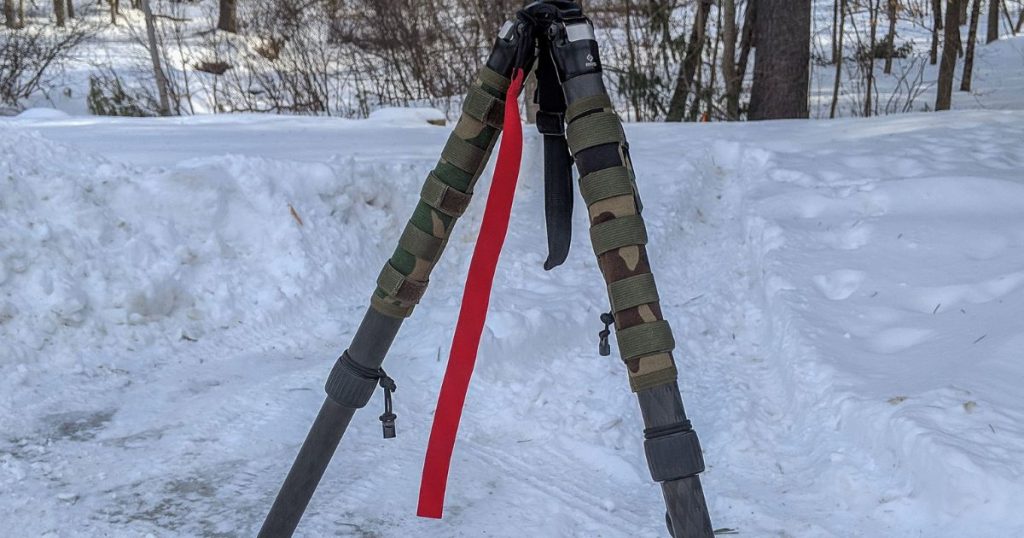 A Cole-TAC Wind Flag in red attached to a tripod.