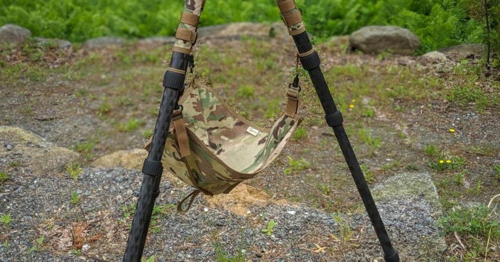 A Cole-TAC Rock Bag attached to a tripod for stability.