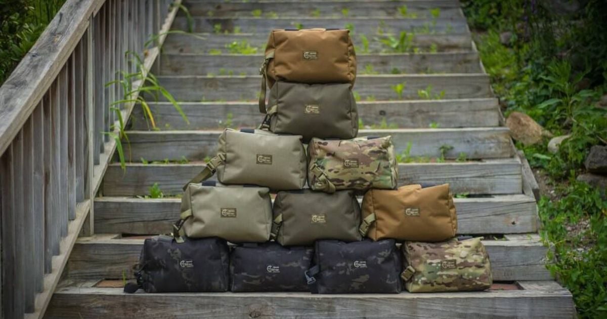Cole-TAC Cuddle Bags stacked on top of each other on wooden stairs.